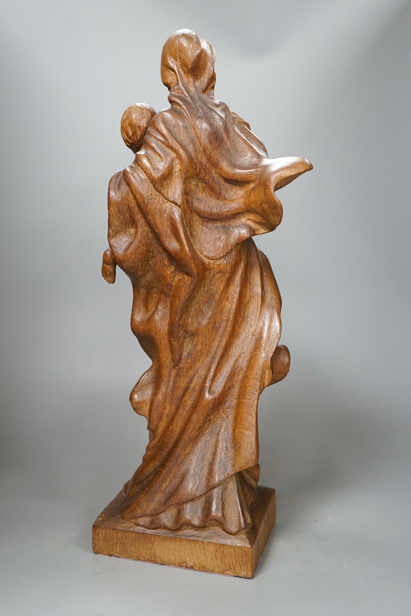 A 19th century carved oak Madonna and child, 49cm